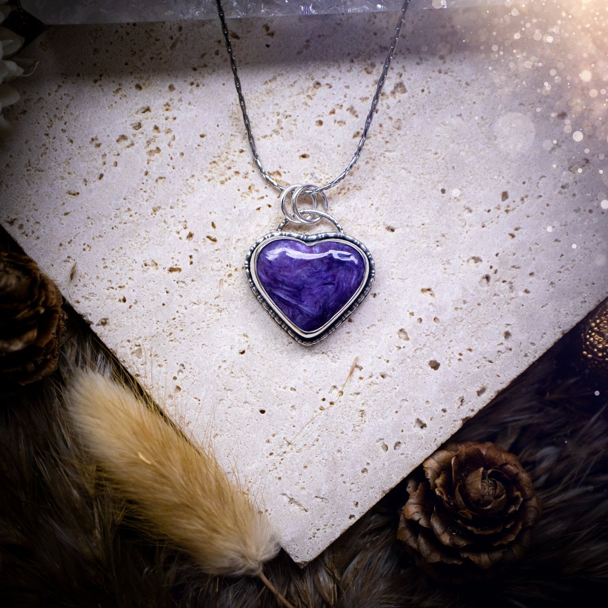 Gorgeous and small, charoite heart crystal, pendant necklace. Made from fine and sterling silver, and featuring a cute little charoite heart! This necklace is handmade and the ideal gift for loved ones, and crystal lovers. Hippy, gothic style.