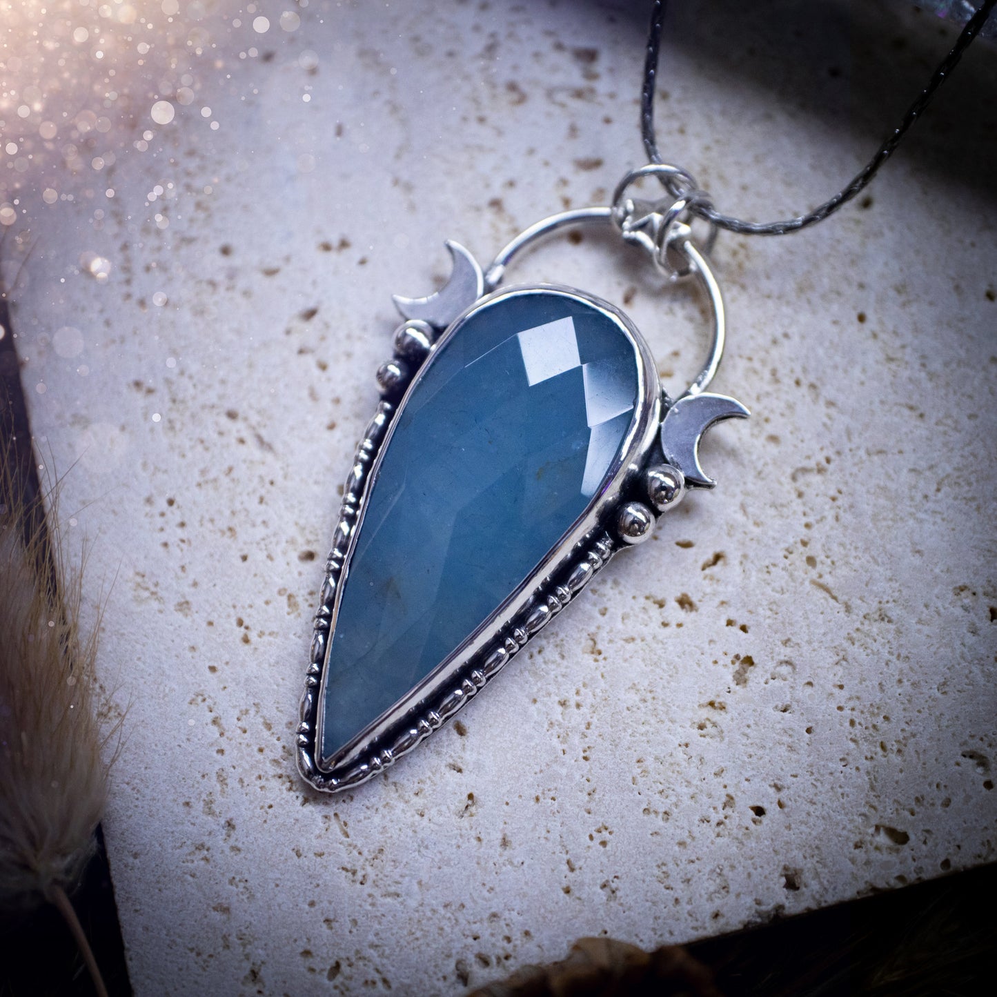 Beautiful and handmade, celestial, natural aquamarine pendant necklace. This pendant has been made using fine and sterling silver and features a gorgeous blue, aquamarine crystal. March birthstone and ideal gift for crystal and jewellery lovers.